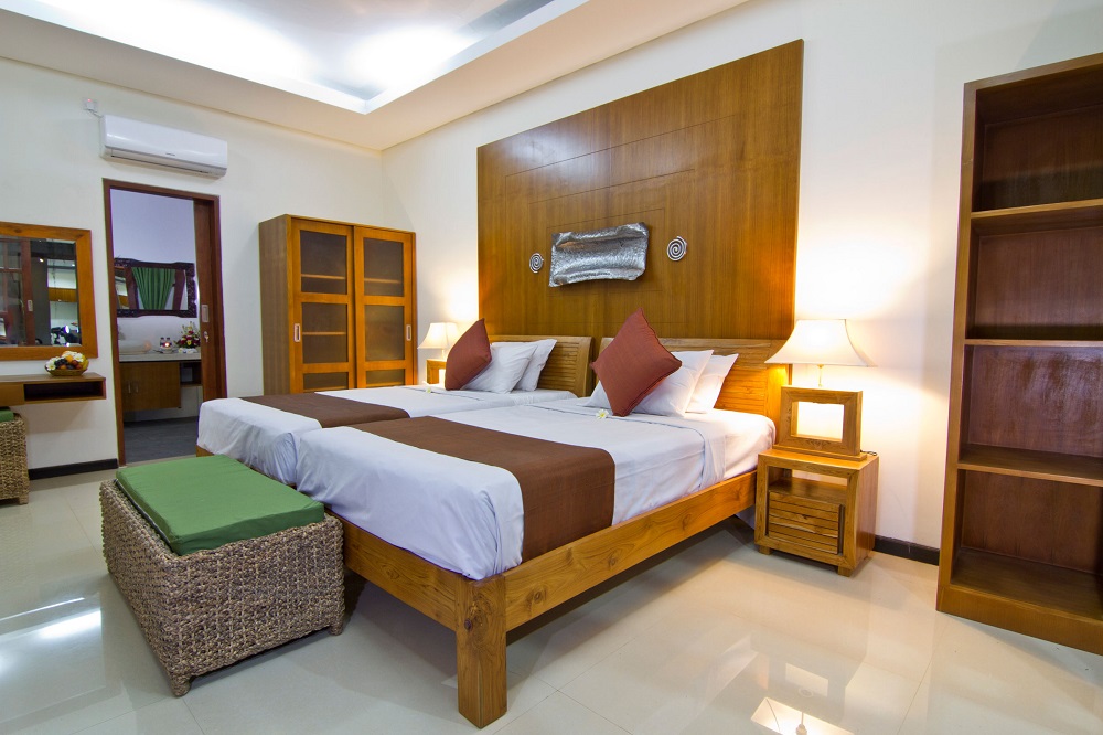 twin bedroom at villa maha with minimalist design